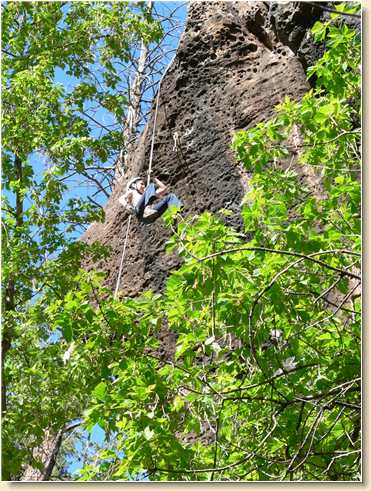 Krista Medina coming down through the trees