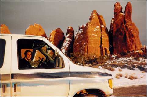 Daniel Adams driving van in Arches National Park, Utah