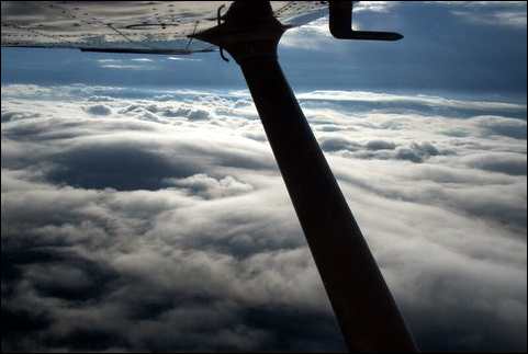 Flying above the clouds in Maine