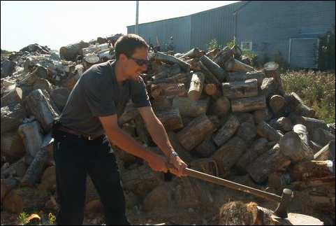 Daniel Adams splitting firewood in Maine
