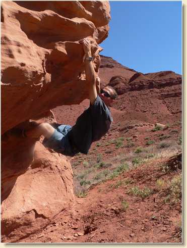 Daniel Adams climbing the overhang