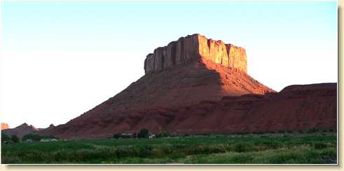 Parriott Mesa at sunrise with DayStar Academy near base