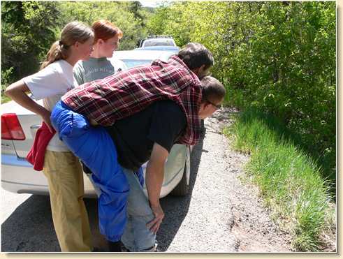 Fred Adams on son Daniel's back in LaSal Mountains