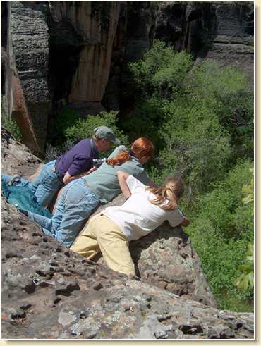 Steve Sage, Heidi Hunt and Lezli Sage looking over cliff edge