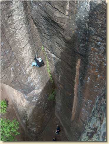 Linda Adams going down the cliff