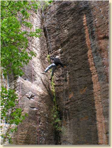 Linda Adams rappelling & jumping