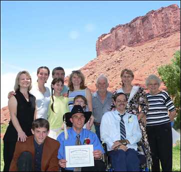Adams and Medina families at Daniel's DayStar Academy graduation