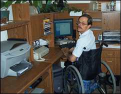Fred Adams at computer in Mosquito, California