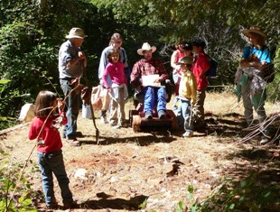 Buck Adams describing Deer View Lodge to homeschool group