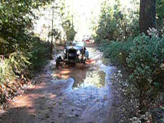 Ford Model A Roadster in puddle near Deer View